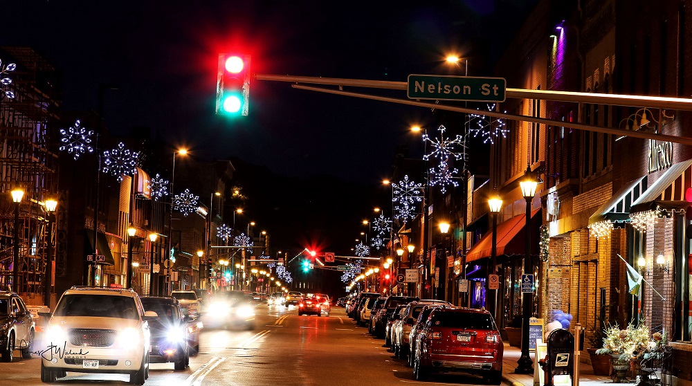 Downtown Stillwater's Main street lit up in the winter at night. 