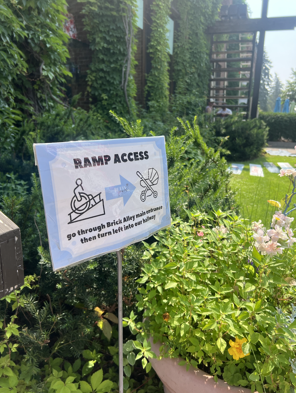 Accessible sign for ramp at Betty June's/Brick Alley Stillwater