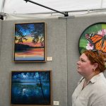 Woman looking at art