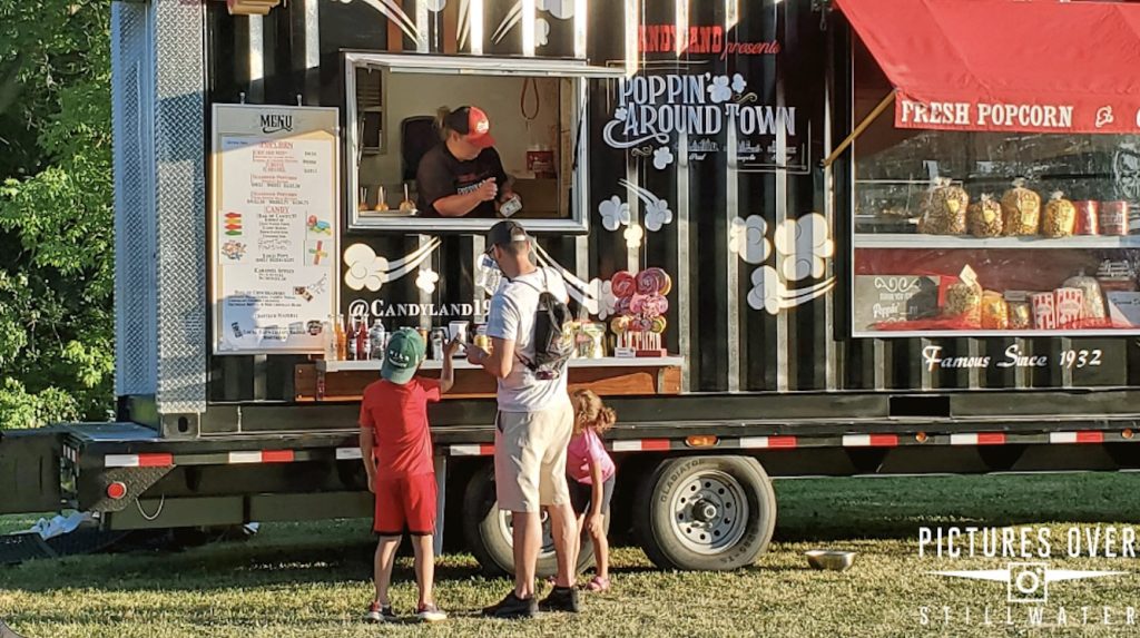 family at a popcorn food truck